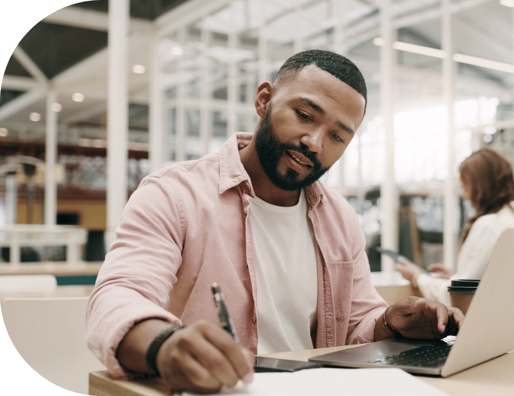 om-website-services-paid-media-man-writing