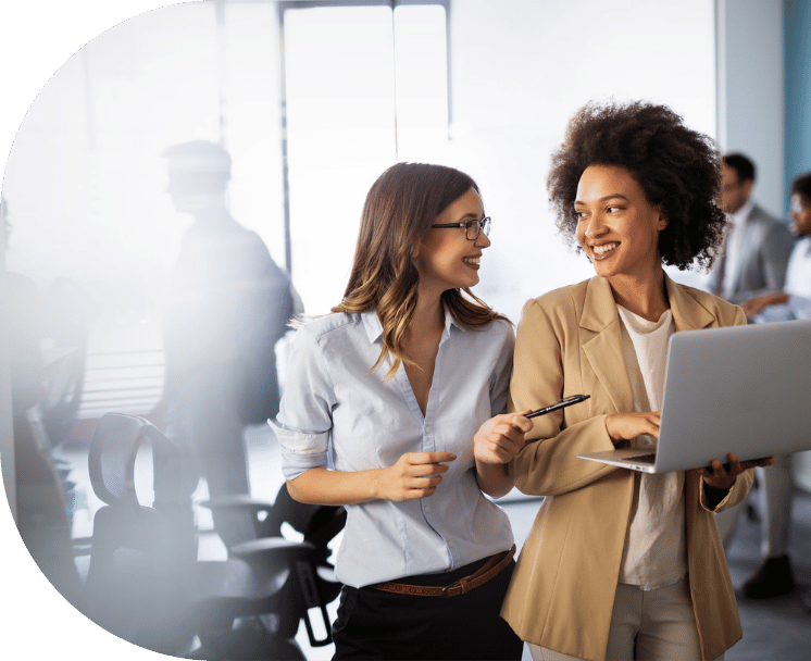 om-website-services-strategy-pillar-two-coworkers-laptop